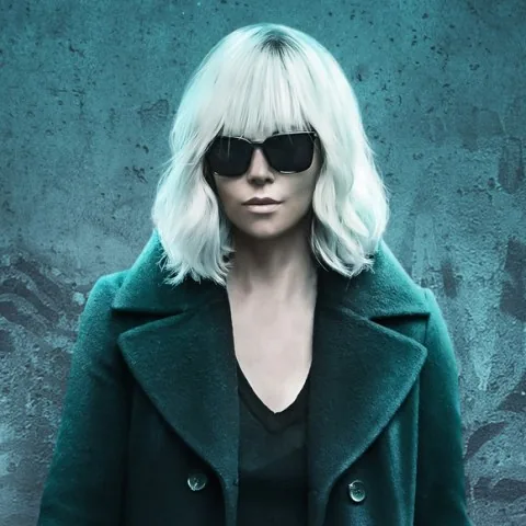 Atomic Blonde in the miniature bar.